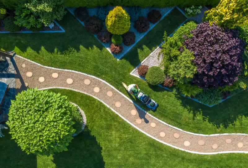 Aeriel view of a landscaper working in a yard